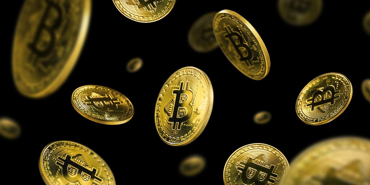 Mascherata la truffa dei Bitcoin (adobe stock)